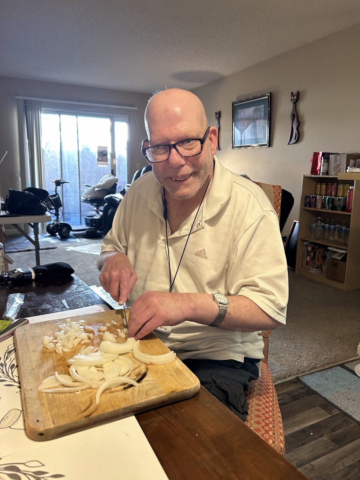 An ATS participant preparing a meal in his own kitchen